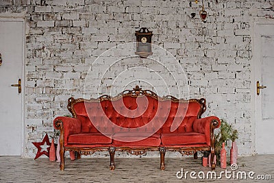 Vintage royal red sofa in a room Stock Photo