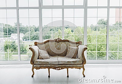 Vintage royal sofa with carved inserts Stock Photo