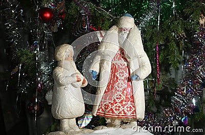 Santa Claus and Snow-girl, antique russian christmas decoration Stock Photo