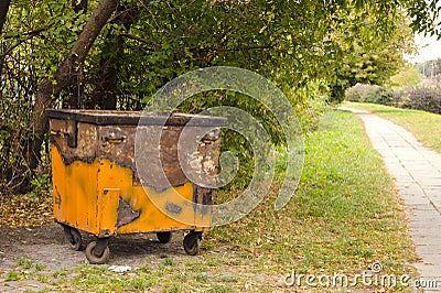 Vintage and rusty dustbin Stock Photo