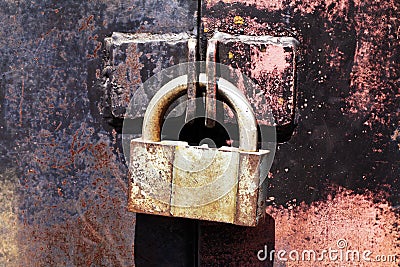 Vintage rusty padlock metal gates Stock Photo