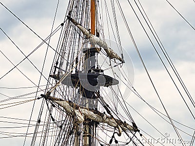 Vintage sailing ship mast ropes and tackle, Tall ship rigging mast detail, blue sky Editorial Stock Photo