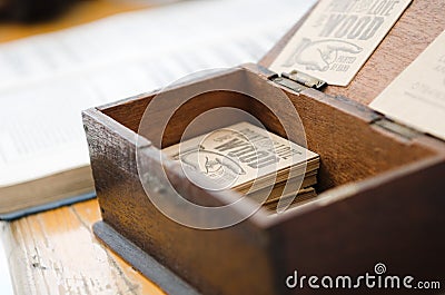 Vintage screen printed cards in a wooden box Stock Photo