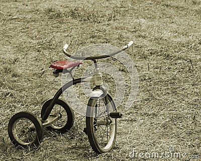 Vintage Sepia Tricycle Stock Photo