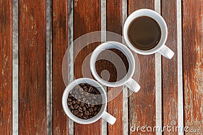 Vintage Set up shot of black coffee with milk. Stock Photo