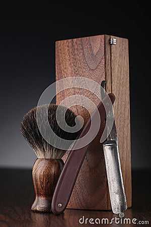 Vintage shaving equipment on wooden table Stock Photo