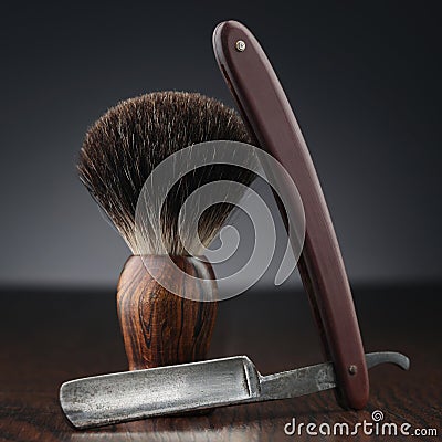 Vintage shaving equipment on wooden table Stock Photo