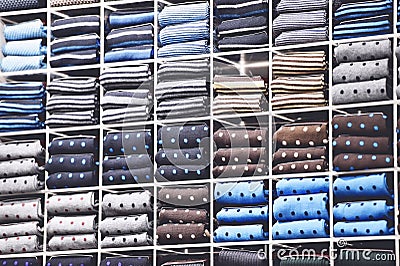 Vintage shot with different silk neckties on shelves Stock Photo