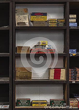 Vintage shotgun shells cartridge boxes by Remington, Winchester and other ammunition manufacturers at a gun shop Editorial Stock Photo