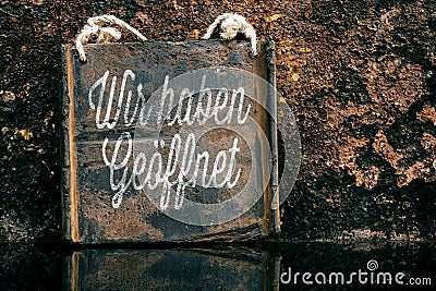 Vintage sign with german text, rusty background Stock Photo