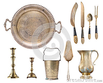 Vintage silver gilded with patterns spoon, fork, knives, candlesticks, tray, jug, spatula for cake, champagne bucket isolated on w Stock Photo