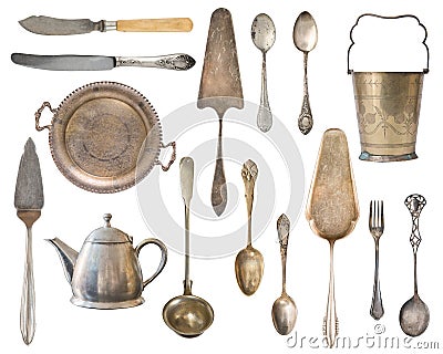 Vintage Silverware, antique spoons, forks, knives, ladle, cake shovels, kettle, tray and ice bucket isolated on isolated white Stock Photo