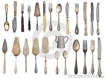 Vintage Silverware, antique spoons, forks, knives, ladle, cake shovels, kettle, tray and ice bucket isolated on isolated white Stock Photo