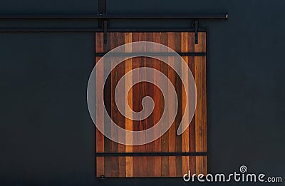 Vintage slide wooden door with black wall Stock Photo