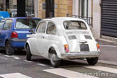 Vintage small white Fiat 500 car back view Stock Photo