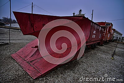 Vintage Snow Plow along the Tracks at the Atchison Rail Museum in Kansas Editorial Stock Photo