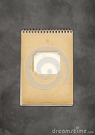 Vintage spiral close notebook on concrete background Stock Photo