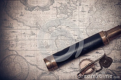 Vintage spyglass and whistle of the boatswain. Stock Photo