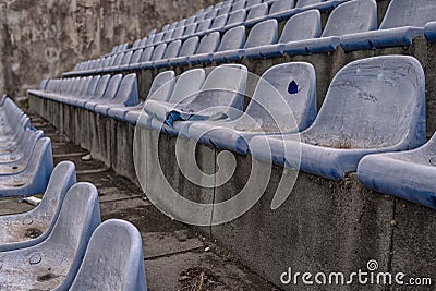 Vintage Stadium Chairs old time not used with dust blue color Stock Photo