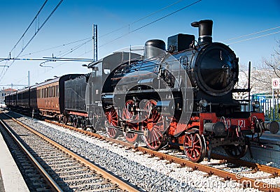 Vintage Steam Locomotive at the station Editorial Stock Photo