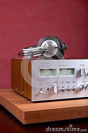 Vintage Stereo Amplifier Front Panel and Cabinet with Headphones Stock Photo