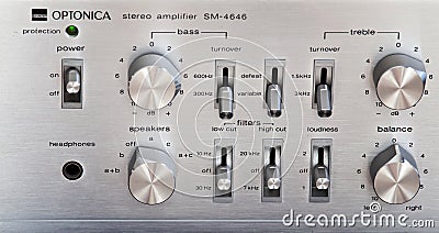 Ontario, Canada - December 22 2017: Vintage Stereo Amplifier Shiny Metal Control Knob Panel Editorial Stock Photo