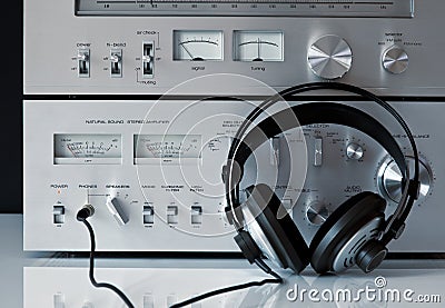 Vintage Stereo Amplifier and Tuner with Headphones Stock Photo