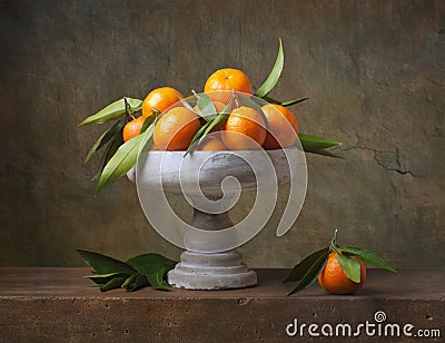 Vintage still life with tangerines Stock Photo