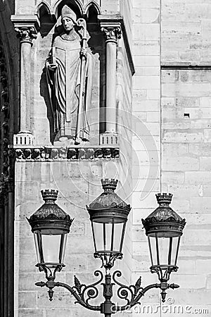 Vintage street lantern lamppost in front of Notre-Dame de Pari Editorial Stock Photo