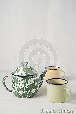 Vintage stripes vitreous enamel teapot isolated on white Stock Photo