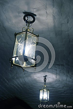 Vintage style chandeliers made of glass and metal. Stock Photo