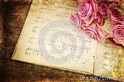 Vintage style picture of roses and music notes Stock Photo