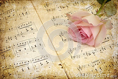 Vintage style, pink rose with music notes Stock Photo