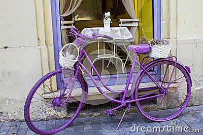 Vintage Style Purple Painted Bicycle in Vienna Street Stock Photo