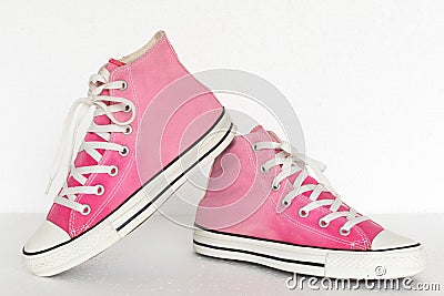 Vintage style of sport pink gradient sneaker shoes on white back Stock Photo