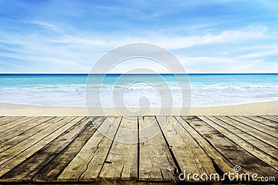 Vintage table top with blur tropic beach and sea. Summer bokeh background and tabletop for product montage display. Sunny paradise Stock Photo