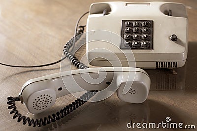 Vintage telephone with brown buttons. Stock Photo