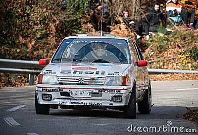 Vintage 69th edition of the Costa Brava rally Peugeot 205 1.9 GTI on a racing road Editorial Stock Photo