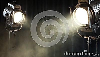 Vintage theater spot light on black curtain Stock Photo