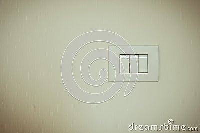 Vintage tone of light switch Stock Photo