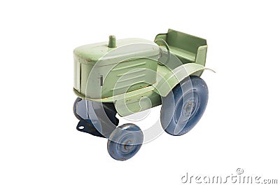 Vintage toy green metal tractor with blue wheels on white isolated background Stock Photo