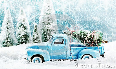 Vintage toy truck fetching a Christmas tree Stock Photo