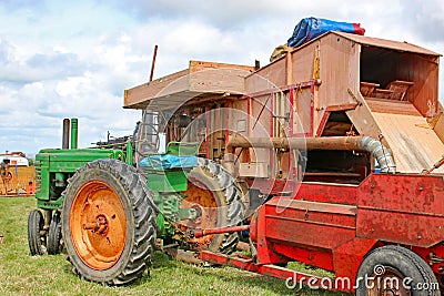 Vintage tractor and thresher Editorial Stock Photo