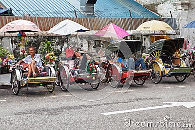 Vintage Trishaw stop beside road Editorial Stock Photo