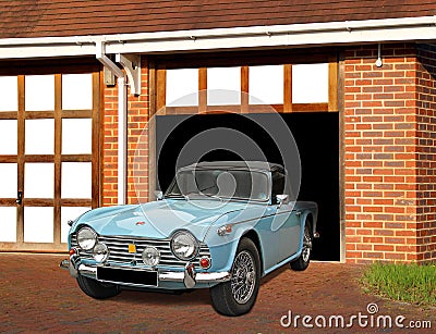 Vintage triumph tr4 sports car in garage Stock Photo