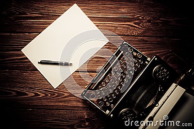 Vintage typewriter and a blank sheet of paper Stock Photo