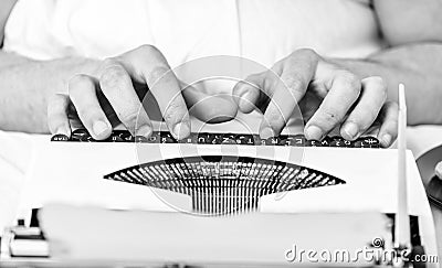 Vintage typewriter concept. Hands typing retro writing machine. Old typewriter and authors hands. Male hands type story Stock Photo
