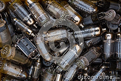 Vintage vacuum lamps for vintage electronic. Old electronic components background Stock Photo