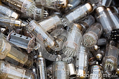 Vintage vacuum lamps for vintage electronic. Old electronic components background Stock Photo