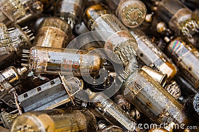 Vintage vacuum lamps for vintage electronic. Old electronic components background Stock Photo